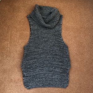 Gray turtleneck sweater with no sleeves